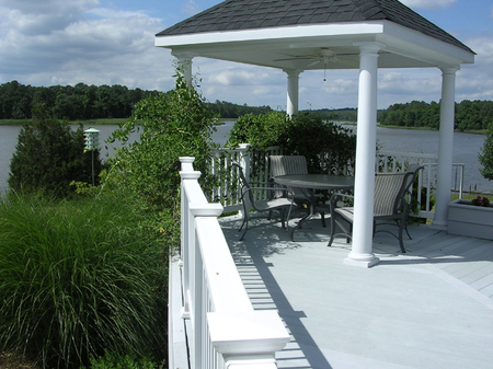 Vines and grasses wrap this deck to integrate the fabulous view to the river. : Summer : Richmond VA Landscape Designer: Gardens by Monit, LLC: Monit Rosendale landscape designer Richmond and Charlottesville Virginia and Fredericksburg Virginia and Williamsburg Virginia