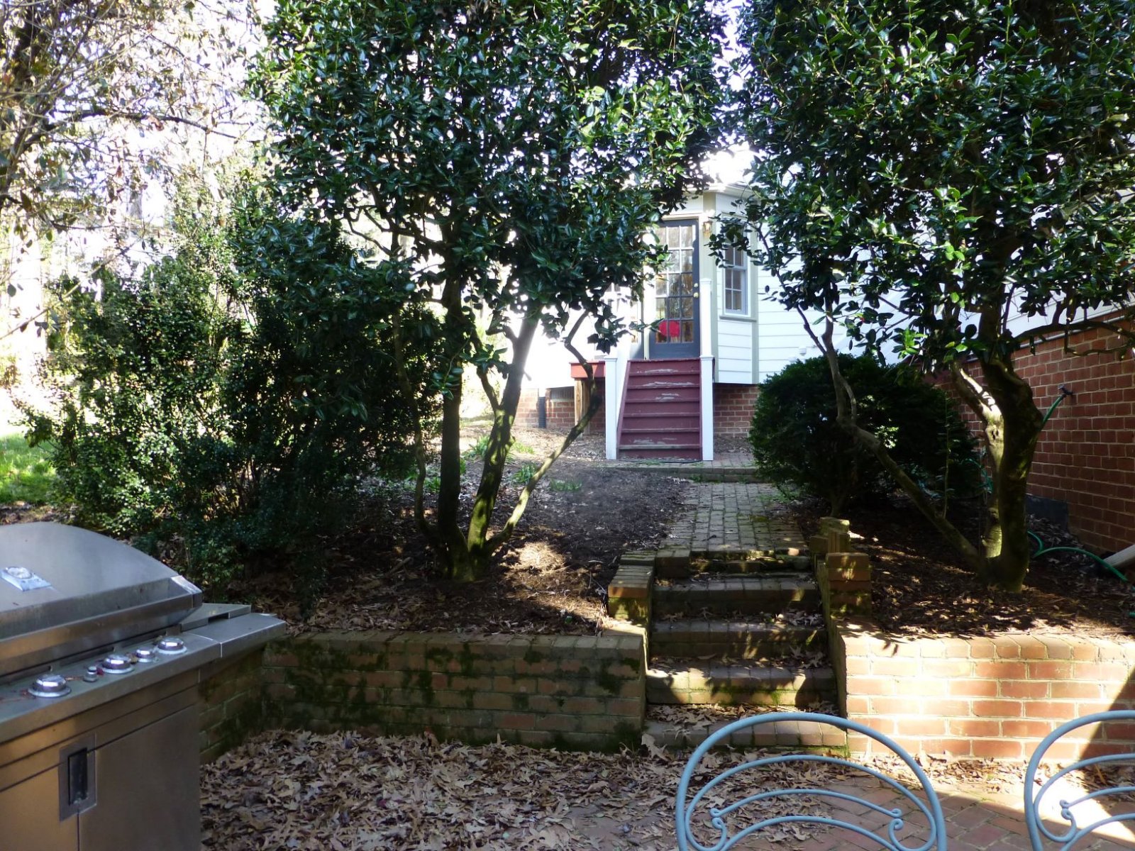 Before: Limited usable outdoor living space and poor access. : Before/After : Richmond VA Landscape Designer: Gardens by Monit, LLC: Monit Rosendale landscape designer Richmond and Charlottesville Virginia and Fredericksburg Virginia and Williamsburg Virginia