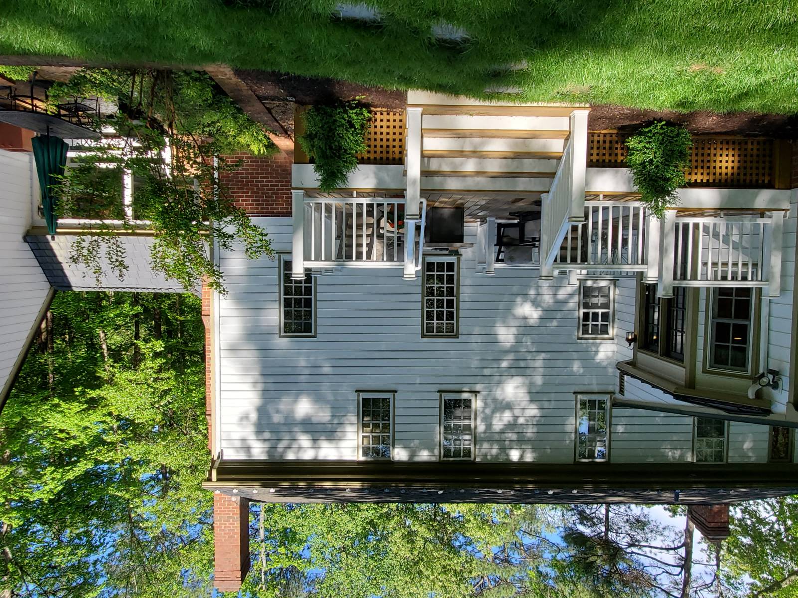 After: One door, one set of steps off the deck, brick retaining walls, and garden.  : Before/After : Richmond VA Landscape Designer: Gardens by Monit, LLC: Monit Rosendale landscape designer Richmond and Charlottesville Virginia and Fredericksburg Virginia and Williamsburg Virginia