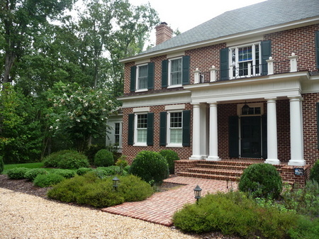 Boxwoods are perfect for this traditional home.