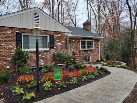 Just completed. New paver walk, retaining wall and plantings.  Spirea Doozie still with fall foliage color.