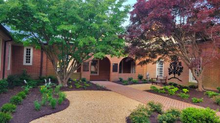 Memorial Garden After: New herringbone brick walk and garden renovation.